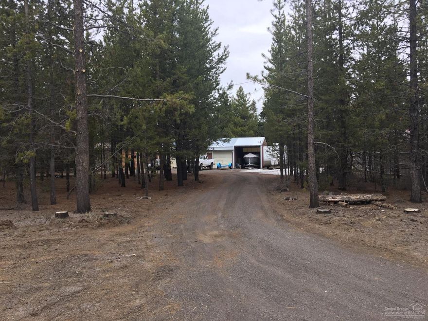 3 Bedroom 2 Bath Manufactured Home on 1.02 Acre Lot. This Home has a Great Addition that has been added on and is included in the Sq Footage. 3 Bay Shop that is attached by a Breezeway with tons of Storage. Chain Link Fence around the Home for your pets.