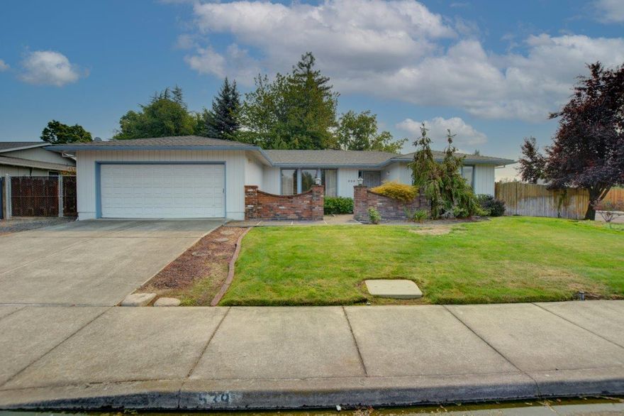 This Single Level Ranch style home sits in a great neighborhood close to shopping, healthcare, restaurants and wineries. A large living room, formal dining room, and great room with built-in bookcases, wood fireplace, a slider to backyard and covered patio. Very large master with en suite bathroom and large walk in closet. Bedroom #3 has built in cabinets. Nice backyard with large trees, fruit tree, roses and lawn. Patio for bbq's and dining. Good spot for garden. Possible RV storage. Oversized two car garage.