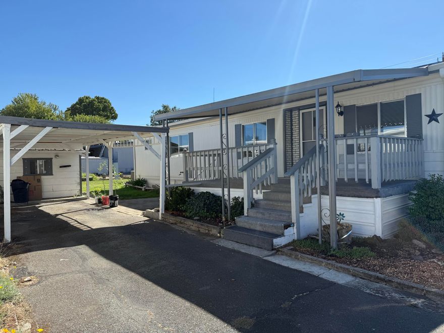 Don't miss the opportunity to join this peaceful riverside community. This in-park home with private Rogue River access is located in the highly desirable Riviera MH 55+ Co-Op.  This member-owned community provides a country setting just minutes to town. A 2 Bedroom, 2 bath home (both primary suites) has been freshly painted, nearly all new flooring, recent HVAC repairs and service ($1,500) adding peace of mind and year-round comfort, sizable backyard, 2 storage sheds (in need of some TLC), appliances include refrigerator, dishwasher, range/hood.  Enjoy river access, country charm & community living and activities, RV storage for an added fee, & more. 
Relax, Refresh & Connect—Your Next Chapter Starts Here. Must be Park Approved. Space Rent  $700 per month (buyer to verify) & includes water, sewer & trash! One Pet allowed NTE 35lbs. Must have accepted offer prior to submitting for park approval.