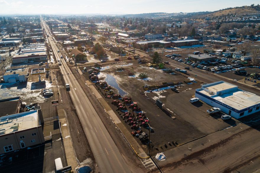 A prime piece of property in downtown Madras located on Oregon's second most traveled north-south highway. Bounded by HWY 97 on both sides, this commercially zoned property (C2) allows a variety of uses with a high level of visibility.
Lot size is 1.36 acres