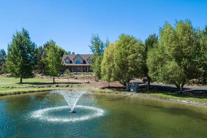 Come watch the sunrise with this is a rare opportunity!! This 17.06 Acre property offers spectaculars setting with a 3387 Sq. Ft. home nestled into a beautiful treed setting. The potentials are endless. This home offers 5 bedrooms 3 1/2 baths with a  three car garage and a  detached 1600 sq ft shop with 2 acres of irrigation. All of this over looks a beautiful 1/2 acre pond and a beautiful water feature. Just 5 minutes from Costco and 10 minutes from the old mill.