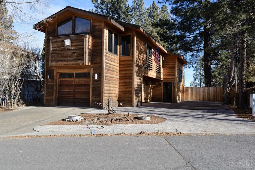 Rare riverfront location! Located near all the best amenities of Bend. Parks, Old Mill district, Downtown, walking trails, biking trails, etc. Large private & fenced back yard with a custom built stone patio to enjoy breathtaking views of the Deschutes River. Grab your paddle boards and kayaks and put in right off the edge of your own property! upper level living, with double deep garage & storage room on lower level for all of your toys and gear! Oversized lot allows to build a new home, or expand existing structure. This is a rare opportunity with options!