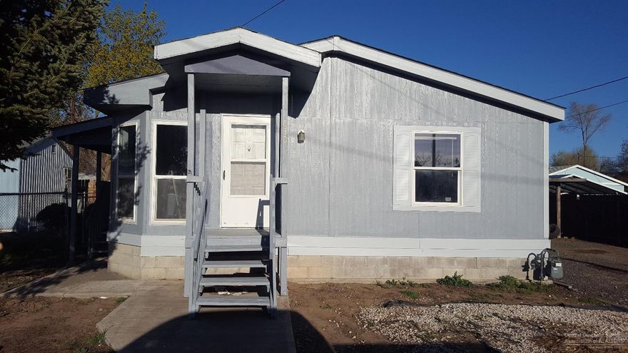 Cute 1999 home that is close to school. 3 Bedrooms 2 baths, open floor concept, and three walk in closet. home is on its own well and septic system and boast .22 of an acre. Large out building that includes a car port and lots of storage room. Block foundation with tie downs. If football is your game you are within walking distance of the field.