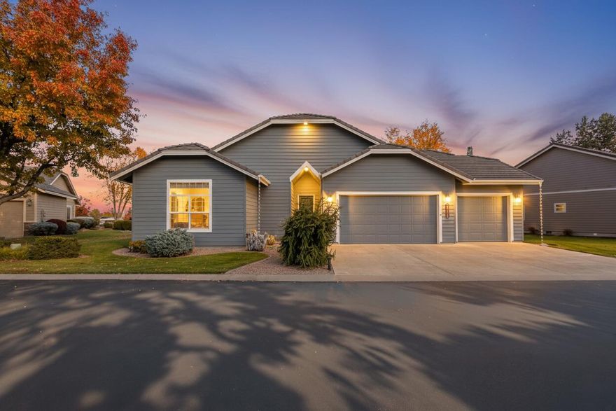 Amazing Canyon Views from your covered back Deck! Overlooking Redmond's Dry Canyon in the Cliffs All ages Gated Community. Move in Ready with newer exterior paint, tankless water heater, blinds & flooring. Single Level with Spacious 10 ft Ceilings throughout. 3 Car Heated garage. 2 Gas fireplaces in Primary Bedroom and Great Room. HOA covers Landscaping Maintenance front and back yard. Schedule a Showing Today! County records indicate 3rd bedroom as an office, which is it's current use. Some photos are Virtually Enhanced by AI.