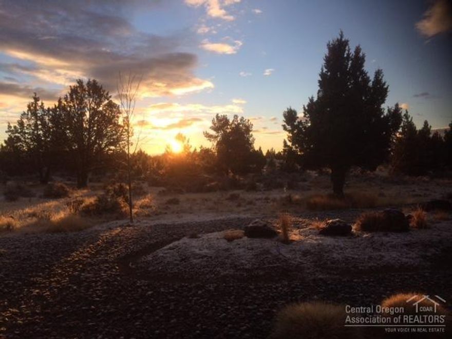 Walking thru the front door into the Great Room, you immediately see those incredible Cascade Mtn views! This single level, 3bed/2bath home sits on top of a small bluff giving you the feeling of wide open living. This home is perfectly designed with the master separate from the other two bedrooms. Beautiful wood floors. Custom knotty alder cabinets. Propane gas rock fireplace with wood mantle. Hot tub outside the master bedroom. Open kitchen with upgraded counters and SS appliances. Tile in the bathrooms on both the floor and counters is Travertine marble. This house is very energy efficient from the higher grade insulation on the roof, walls & crawl space, to how the house was placed on the property to take advantage of passive solar gain through the Jeld-Wen dual-pane high end windows. Oversized 3-car garage with room for work area and storage. Custom wood garage doors. Paver patio in the backyard. Natural, low maintenance landscaping with drip lines around the house.