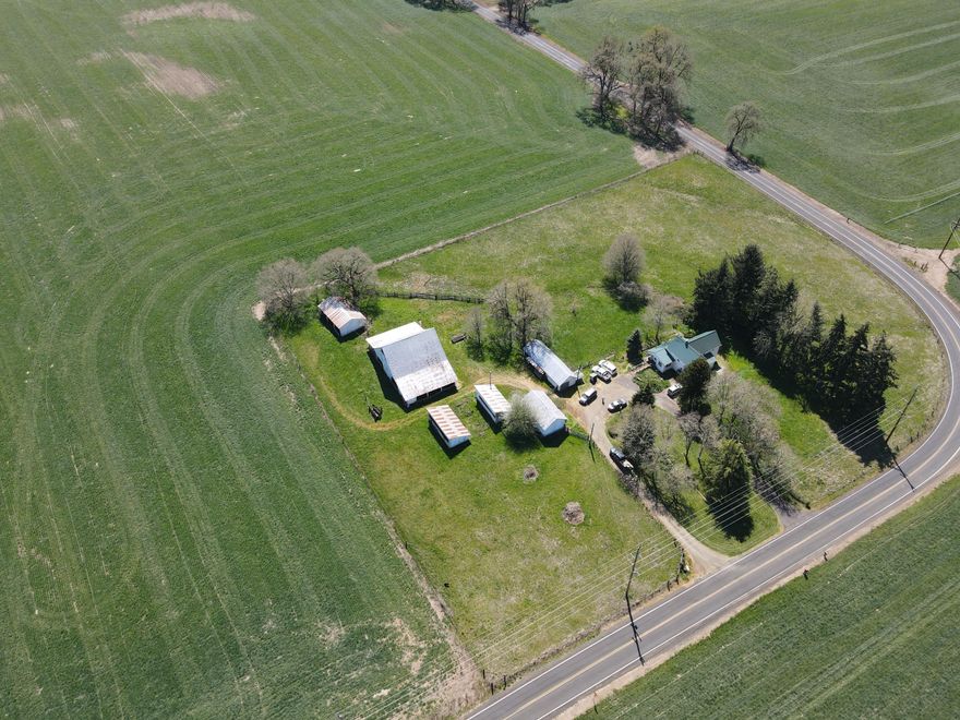 You've waited 75+/- years for this property to be available, don't miss your opportunity. 3 bedroom, 1.5 bathroom house situated on a beautiful 119 acre farm located in the highly productive mid-Willamette Valley. Currently producing Orchard Grass hay and seed. With approximately 106 acres of water rights and flat fertile native soils this property is ready to grow your dreams.