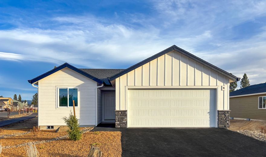 This new construction home is located at Reserve in the Pines, surrounded by year-round outdoor recreation with open spaces and adjacent to a community trail. The Daisy plan is a three-bedroom home that offers the convenience of single-story living. Off the foyer are two bedrooms and a full bath, leading to an open-concept layout that combines the kitchen, great room, and dining area. The primary suite is tucked into a private rear corner and features an en-suite bath with a double vanity and a spacious walk-in closet. Interior highlights include quartz countertops, shaker-style cabinetry, and luxury vinyl plank flooring in the kitchen and bathrooms. This home also includes central AC, a refrigerator, a washer and dryer, a xeriscaped front yard with a drip irrigation system, and blinds—all at no extra cost! Homesite #138. Expected completion: January 2026. Rendering is artist conception only. Photos are of a similar home, features and finishes will vary. Taxes are not yet assessed.