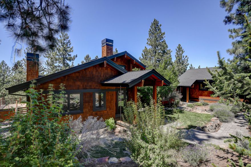 Rare find on Awbrey Butte with a quality custom built home and a Studio Apartment/Office! On a half-acre lot with Cascade Mountain views, this light and bright beauty features a spacious Kitchen suitable for entertaining, an open Great Room with red-oak floors and wood-burning fireplace, plus loft-space for that special hide-away. 2 Bedrooms and Guest Bath on the main level, with the Primary Bedroom Suite and bonus room on the lower level. Just steps away from the main house, you'll find a 1 Bed, 1 Bath Studio for guests or for the ideal Home Office. The detached 2-Car Garage is oversized for additional storage. This one is a must see!