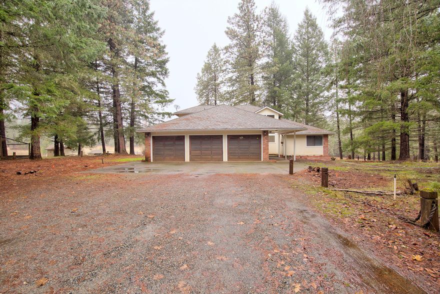 PRIVACY & VIEWS!!! Located behind a gated entry, the private road leads to this beautiful 3 bedroom, 2657 sq ft home with spectacular pastoral & mountain  views. Sitting on 30 acres there is plenty of room to play & roam. As you make your way through the foyer, you'll notice the home has a semi-hex flow with dining room access to the deck. The picture windows allow plenty of natural lighting, and the tall ceilings offer a open modern feel. Master with walk-in closet is on the main level making this the perfect property for any type of buyer. Features include 3 full bathrooms, wood burning stove, bonus room, 3 car garage, enclosed garden area, cross fence, and out buildings. This is NOT a drive by property, on a private road.