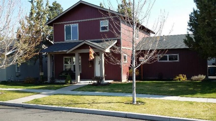 Larkspur neighborhood beauty in SE Bend offers 1692 sf of living space with 3 bedrooms and 2 1/2 bathrooms. Gorgeous fully fenced back yard with a custom built greenhouse adds to the allure of your outdoor living space. Gas fireplace in living room. All bedrooms upstairs. Large walk-in master closet. Double sinks in master bathroom. Tree lined street, alley access. Two car garage with a built-in enclosed shop area for your projects.