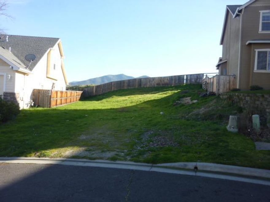 Great residential lot and one of the last lots in the Willow Springs Estates Subdivision. You will love the orientation of this lot where the back of the house can be south facing. The neighborhood is close to bike path and downtown Talent and has good access to the freeway. The lot is ready to be built on.