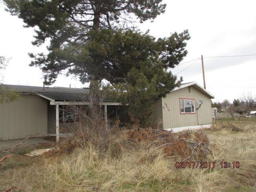 Nearly 1.32 of an acre with large home and even bigger shop! This property has so much potential and priced accordingly!