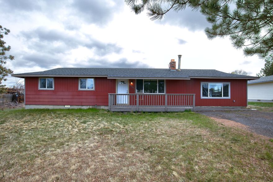 Close in starter home with lots of potential on almost half acre.  Fenced in a quiet established neighborhood.  Room for large shop/barn and toys.  New septic within 5 years.  Property sold AS-IS.