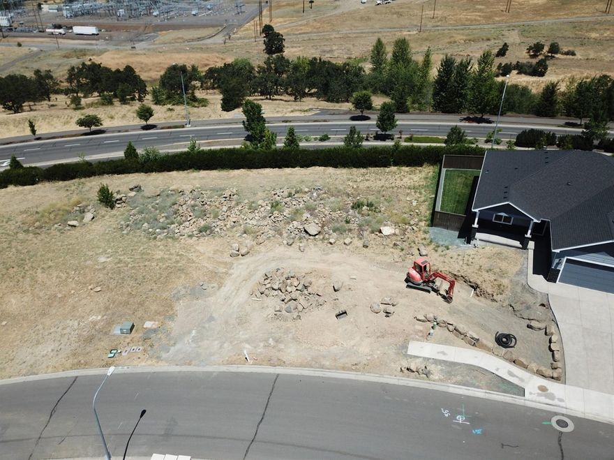 Time to buy this attractively priced, shovel ready View lot for sale in Medford's premier subdivision: Bella Vista Heights. Unlike most developments in East Medford, there is NO minimum building square footage requirement, all building designs to be approved by the Architectural Review Committee. Seller is offering courtesy to builders; multiple lot purchase discounts available. Call for details. HOA Dues $79.50/month/Lot 37