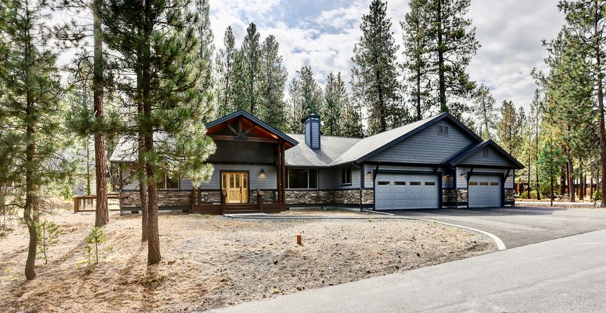 Classic NW architectural features combine with sleek contemporary design elements in this 3BR/2BA + heated 3rd bay garage/shop with half-bath and private office.  This 2019 quality-built custom home features a dramatic floorplan with quartzite stack-stone propane fireplace, acacia hardwoods, pine vaulted ceilings, grand Teltos quartz kitchen island, and upgraded stainless appliances, including a double-oven convection range for the cook's convenience!  Ample hemlock/fir decking wraps the south flank of the home and transitions into a handy dog run for your favorite canine pal.  The lush and forested .46 acre homesite, located just footsteps from Wild River's otter pond and the rushing whitewater of Pringle Falls, offers a sensory-rich setting and respite from a busy world.  This stunning home is near-new, providing a turnkey alternative to a lengthy construction project. Experience Big Deschutes River community living today and move in before the snow flies!