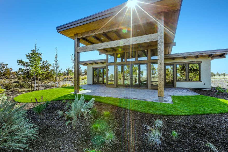 Wright Design home in Four Peaks at Pronghorn offers privacy and a Mountain View! Backing up to the private 18th Fairway of the Tom Fazio Course, this Mountain Modern home is tucked in among a beautiful rock outcropping. Thoughtful finishes including vaulted, beamed ceilings, clear story windows, large glass doors opening to expansive paver patio & fire pit. Open kitchen with custom cabinetry & built-in bar flows
directly into living space with full height Stone Fireplace. Primary bedroom with a tiled, walk-in shower & double vanity. Quartz, tile & hardwood surfaces throughout the home. Short term rental opportunity! Easily accessible to all Juniper Preserve amenities! 36 holes of Championship Golf on Fazio & Nicklaus, Troon golf benefits, Private Members Club, Restaurants, on-site Market, Concierge Services, Day Spa, Pools/Hot tubs, Fitness & Wellness Center, Staffed 24-hour Gate, Pickleball, Dog Park, trails & access to public lands. Includes Pronghorn Premier Club Membership.