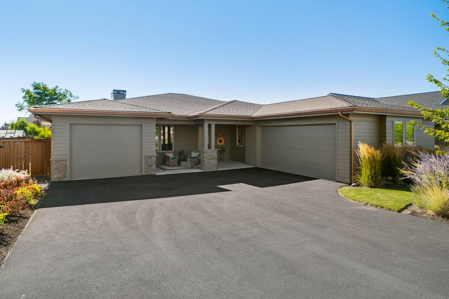 Sellers offering Buyers a $10,000 credit for closing costs! Fabulous single-level floor plan featuring timeless high-end finishes, three bedrooms; two with en suite bathrooms, and a third full bath. The great room features a gas fireplace, built-in storage cabinets, and a large dining area. Chef's kitchen with expansive island with breakfast bar, stainless appliances, gas range, and walk-in pantry. The den is adjacent to the living area and features a barn door slider and closet. Luxurious primary suite with spacious walk-in shower, dual-sink vanity, and walk-in closet. Large Jr suite, additional third bedroom, and full bath for guests and family. The covered front courtyard and covered back patio provide ample space for enjoying the beautiful Central Oregon weather year around. Beautiful low maintenance landscaping and fully fenced backyard. Unique split triple-car garage offers flexibility as the single bay could be used as a workshop or art studio. Fresh interior  & exterior paint.