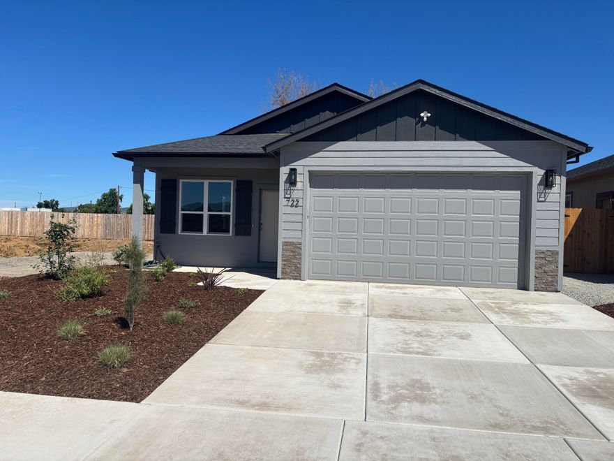 Beautiful new construction home offering 1,404 sq ft, 3bedrooms, and 2 bathrooms, thoughtfully designed with quality finishes and modern upgrades throughout.  The open great room features 9-foot ceilings, creating a spacious and inviting living area.  The  kitchen showcases Gary Smith custom cabinetry with soft-close doors & drawers, granite countertops throughout the home, an undermount farmhouse sink, and stainless appliances, including the refrigerator.  Durable waterproof plank flooring flows through the main living areas, complemented by upgraded light fixtures.  Additional features include a finished garage with opener, covered patio with ceiling fan, and a fully landscaped and fenced yard.  Move-in ready with attention to detail and modern comfort in mind. 
The seller will credit buyers $5,000 to help pay closing and pre-paid cost.
Convenient Medford location near Rogue X Community Sports Complex.