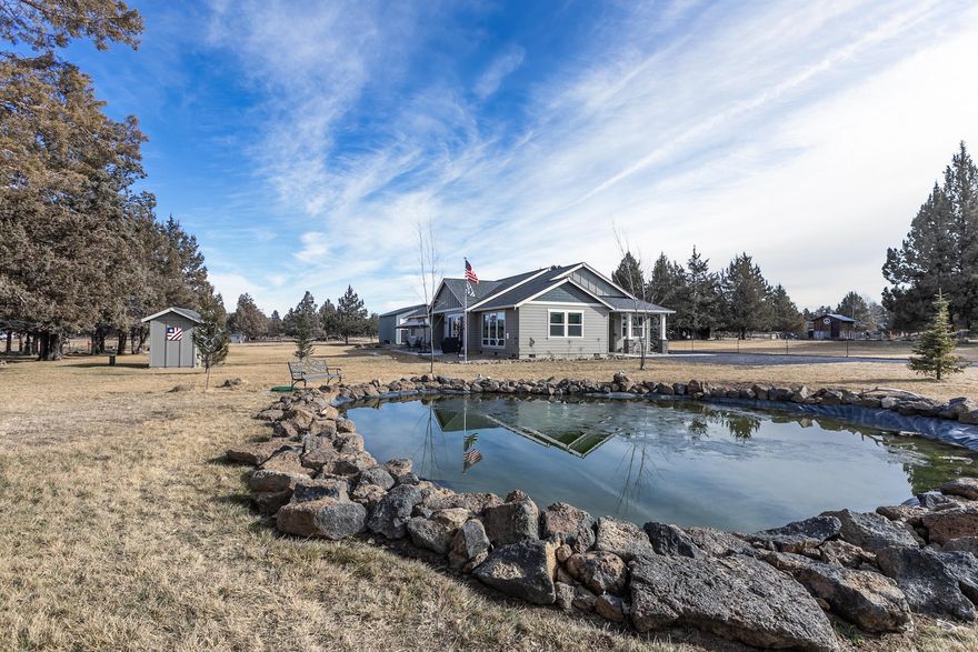 Hard to find close in small acreage with an absolutely beautiful, almost new, great room style single level home plus a 30'x48'x16' shop with RV door. This home has a spectacular floor plan with spacious master suite with his and her closets. Master has good separation from guest bedrooms. There is a large bonus room, a huge 4th bedroom current owners use as a flex room and an office too. The bonus room and 4th bed/flex room is also separated by the laundry/mud room making for an excellent option for the highly sought after in-law floor plan. The chef's kitchen is light and bright with a large island, nice stainless steel appliances and gorgeous leathered granite countertops. The property is about as immaculate as they come, fully fenced with an automatic entry gate, 1.4 acres of irrigation rights with all underground and fully automated irrigation. This home has too many amenities to list here. Come see this slice of Central Oregon heaven today and make it your own!