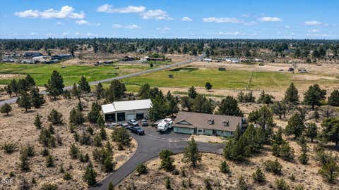 Photo of 118 SW Bent Loop, Powell Butte, OR 97753 (MLS # 220226720)