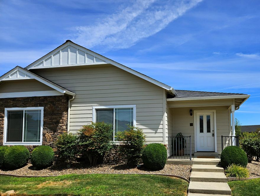 First time on the market, in the popular Snowy Butte Station Subdivision, this Row-Style home offers comfortable one level living, with a nice front entry, stylish laminate flooring, beautiful kitchen cabinetry, and lots of counter space. Both bedrooms are spacious with larger closets, and additional hallway storage. There's convenient parking at the rear, with separate entry. Enjoy the nearby park for relaxing and family get-togethers. Other amenities include a fenced patio and private garage. This home is also located in a non-smoking community.
