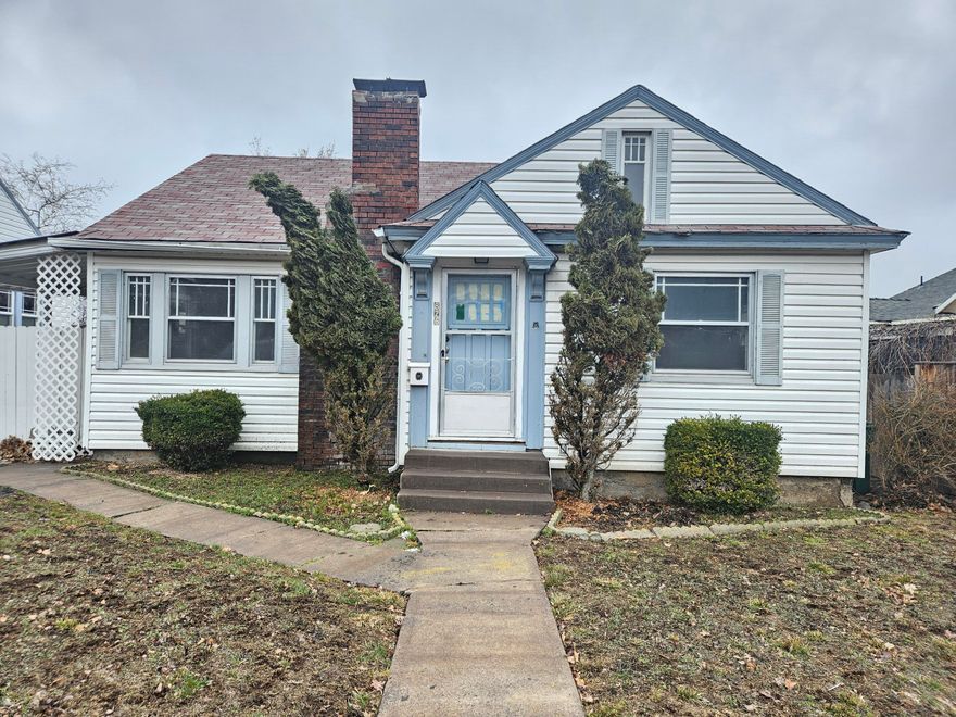 This charming home is located in the Hot Springs subdivision. It is not far from downtown and the hospital. There is a dining area off the kitchen. Coved ceilings, arched doorways and fireplace in the living room. Full partially finished daylight basement with an attached garage that has alley access. Finished attic area could be used for another bedroom.