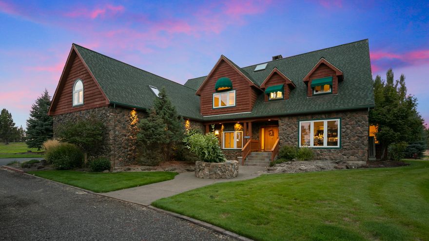 Gorgeous horse property on 38.95 acres with 14.5 irrigated acres. The 4,035 sq. ft. custom home has a beautiful great room that overlooks a fantastic pond, 5 bedrooms, 3.5 baths, office, second master upstairs and so much more. Enjoy the amazing 6 stall custom 36'x100' barn with heated tack room, viewing room, full kitchen and bath, veterinarian room, double shower & wash rack, automatic waterers, and high quality steel fencing. There is a covered 60' round pen with lights and a brand new 144' X 72' covered arena. The irrigation system is installed on timers with K-line and is hassle-free, two shops, loafing sheds, entry gate & so much more. Ride directly off the property on to BLM! This peaceful private property is perfectly located just minutes from town. Don't miss out on this premiere equestrian estate!