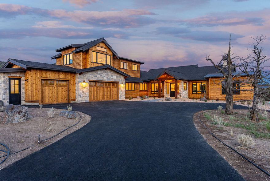 Experience luxury living in this stunning new build by award-winning Rusling Homes, a featured COBA Tour of Homes showcase. Situated on a private lot with open space to the south and breathtaking Cascade Mountain views to the west, this home offers main-level living with a spacious primary suite featuring a fireplace, patio access, and artisan finishes. Two additional guest suites and an office are also on the main level, each bedroom with its own ensuite bath for ultimate comfort. Upstairs, a bonus room or 4th bedroom includes a dedicated bath. The oversized 3-car garage with epoxy flooring provides ample space for a golf cart and toys. Enjoy access to Brasada Ranch's exceptional amenities—pools, golf, fitness center, and dining. True to the hallmarks of any Rusling Homes build, this home blends premium craftsmanship with elegant design, delivering refined comfort and timeless style.