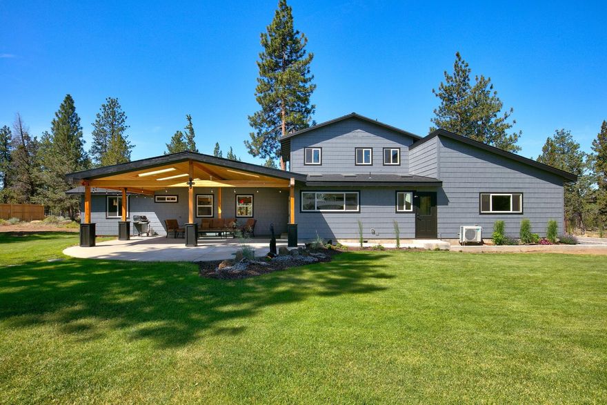 Incredible opportunity for a custom home on 4.6 acres in the pine trees minutes from Sisters. Traditional style home is 3057 sq ft, 3 bedrooms, 2.5 bathrooms with an open floor plan, vaulted ceilings and great room ready for entertaining. Chef's kitchen is big with quality appliances, solid countertops, breakfast bar, farm sink, insta hot, custom cabinets and pantry. Home includes dining room, private master suite with peekaboo Cascade Mountain Views, office/utility room, wood stove, sauna and attached garage with apoxy floors. Wonderful outdoor living with covered patio and hot tub in the private back yard. The shop includes: 2 studios with bathrooms, RV storage 50 amp power and full hookups, attached garage, work area and storage. Barn/Equipment storage, 2 containers and woodshed. This home, shop and property has been completely updated, is move in ready and a must see!