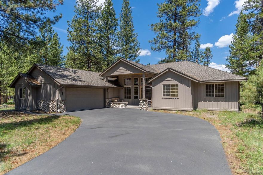 Welcome to your Sunriver sanctuary! Impeccably crafted by Schumacher, this stunning single-level home boasts 3 bedrooms (including 2 primary suites) plus a versatile family room or 4th sleeping area. Inside you'll discover a warm ambiance with wood floors and elegant built-in cabinetry throughout. The open great room features a soaring vaulted wood ceiling, anchored by a river rock fireplace, perfect for cozy evenings. The updated spacious kitchen is a chef's dream with granite counters, stainless-steel appliances, and a breakfast nook. Host gatherings in style with a formal dining area or take the party outside to the expansive deck with a covered hot tub. Plus, enjoy ample storage in the oversized 2-car garage for all your outdoor gear. With river access at the end of the street and SHARC paid, this gem offers the ultimate Sunriver lifestyle. Don't miss out - schedule your showing today! Roof replaced in 2020.