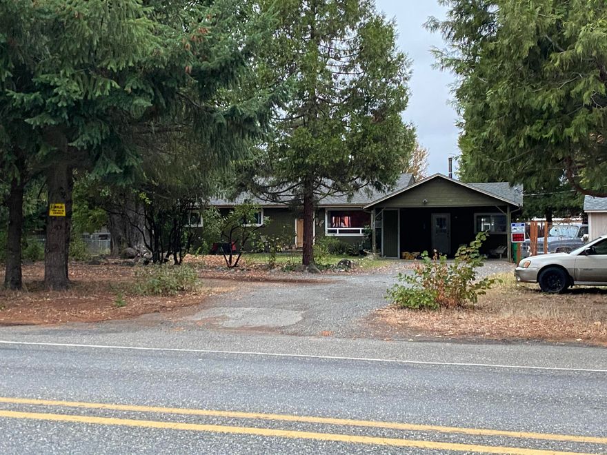 Single level family home has 3 bedrooms and 1.5 bath. Very close to schools and services. Fenced backyard and a nice chicken coop.