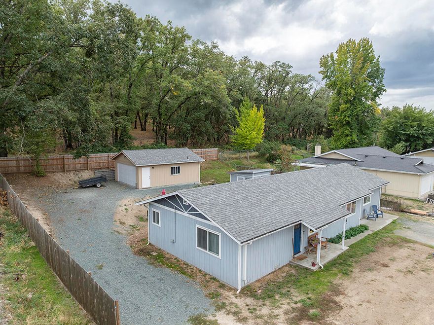 Attractive Well-Maintained Single-Level 3 Bed 2 Bath Home on an Impressive .26 Acre Lot in a Fantastic Location on the Edge of Town! Enjoy a Spacious Living Room with Laminate Floors, a Desirable Split-Bedroom Floor Plan, & a Nice Dining Area! The 3rd Bedroom is huge & can easily accommodate Multiple People. This Home has some Recent Impressive Upgrades, inclusive of a New Roof in 2022, New Ductless Heat Pump, & New Insulation. The Fenced Rear & Side Yards are perfect for Kiddos & Animals! Plenty of Parking, including the 480 Sq Foot Garage/Shop, plus Side RV/Trailer/Boat Parking! Walking Distance to Schools, Shopping & Planet Fitness. You will love the Cathedral Hills Trail System Access that is located just up the Road, offering over 400 Acres of Hiking & Biking Trails! This Home & Property offer the Attractive Feature of being served by Well Water, but City Sewer. Ideally Located just on the Edge of Town on a Quiet Cul-de-Sac, & in a Desirable Neighborhood of just a few Homes.