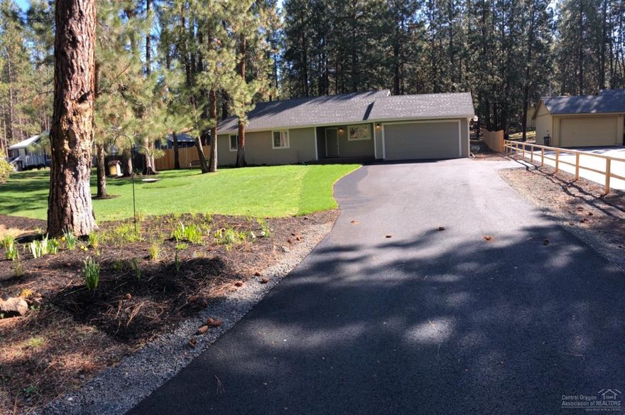 NEW Price Reduction! Brand new paved driveway(neighbors did too!)1 of the very few in DRW! Beautiful granite countertops throughout, kitchen/bath new sinks/faucets, interior/exterior paint, base/trim boards, new bathrm toilets, flooring, stainless steel appliances, Custom cabinets, fence backyard w/greenhouse, flowerbed w/drip system, new front/backyard track decking patio, landscape w/auto sprinklers, large areas for a future Shop/ADU & attached