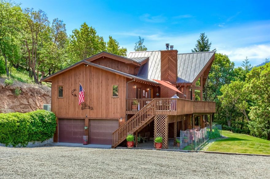 Amazing Linwood Cedar Home on 5 acres of privacy and views in the Applegate Valley just 15 minutes from downtown Jacksonville. This beautiful home has many artistic touches and vaulted ceilings, a spacious master suite, hardwood floors, custom cabinetry. There is a 2 car attached garage and a detached 2040 sq. ft. RV garage/shop. 2 certified woodstoves with beautiful hearths and mantles and a heat pump. Island kitchen and dramatic glass walled dining area. Decks, gardens, perfectly maintained. Pride of ownership. Appointment only, do not drive up on property.