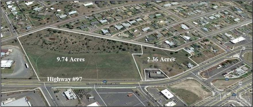 Incredible development opportunity in the growing community of Madras with North Highway 97 Frontage, highway access with water and sewer mains at the property!! It is part of the Madras Urban Renewal Plan with potential for City development funds for infrastructure costs. Property must be Master Planned and neighboring property owners will be cooperative. Great mixed use development project for hotel, retail, commercial, restaurant, fuel, housing, etc. Now available with offer:  Level One Environmental Report, Soils Report, Property Survey & Title Report.  Marketing brochure available.