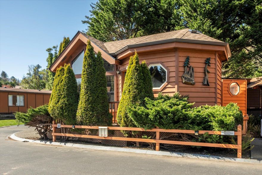 Welcome to your cozy retreat in this peaceful 55+ park! This charming corner-lot cabin offers stunning river views and modern updates throughout. Step inside to find durable and stylish LVP flooring, complemented by a beautifully updated kitchen featuring sparkling quartz countertops. Enjoy the outdoors from your private deck, complete with newer Trex decking—perfect for relaxing with a morning coffee or evening sunset. Conveniently located near the office and community laundry facility, this home offers both comfort and ease. The well-maintained park features river access points for serene strolls and waterfront enjoyment, while the landscaping is taken care of for you. Don't miss the opportunity to make this inviting cabin your own!