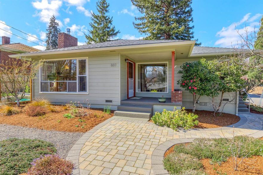 Lovely mid-century, single-level home in one of Ashland's most desired neighborhoods. A gardener's delight, this well-cared for prairie-style home features brilliantly landscaped gardens and multiple raised garden beds. The incredible, private outdoor living space is perfect for entertaining on a summer night. Inside the home, the sunroom, complete with vaulted ceilings and terracotta tile floors, makes for the perfect spot for an afternoon retreat. There are beautiful pecan and oak hardwood floors throughout the main living areas. From the kitchen, enjoy your breakfast with stunning views of Grizzly Peak. The spacious living room is warm and inviting and has large picture windows onto the gardens and a gas fireplace insert. There are three bedrooms and two bathrooms, plus an office or fourth bedroom. There's also an attached carport and large storage shed or workshop. All of this and in an ideal location- close to hiking trails and stores of south Ashland. Come tour this home today!