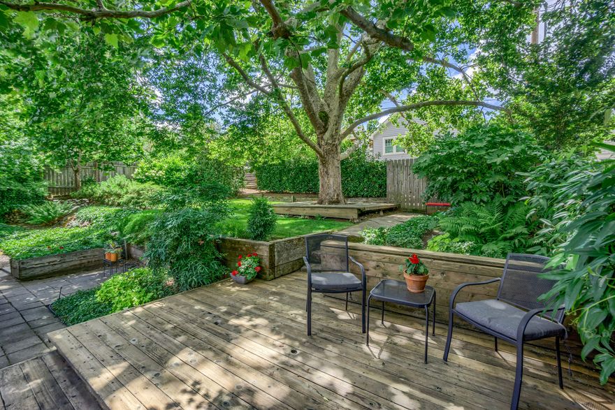 Located in a sought after and established E Medford neighborhood, this single level 50's cottage-style home is move in ready. Extensive Oak hardwood flooring throughout the primary living areas. Flexible floor plan includes a sun filled living room with fireplace, cozy sitting room adjacent to the kitchen and breakfast nook and three bedrooms. The office is oversized (has a closet) and would make a great 4th bedroom/flex space. The primary suite overlooks the lush backyard and has incredible natural light. The kitchen has ample storage, quartz countertops and easy access into the two car attached garage. With alley access from the rear of the property, there is even room for a small RV. Great curb appeal, lots of street parking.