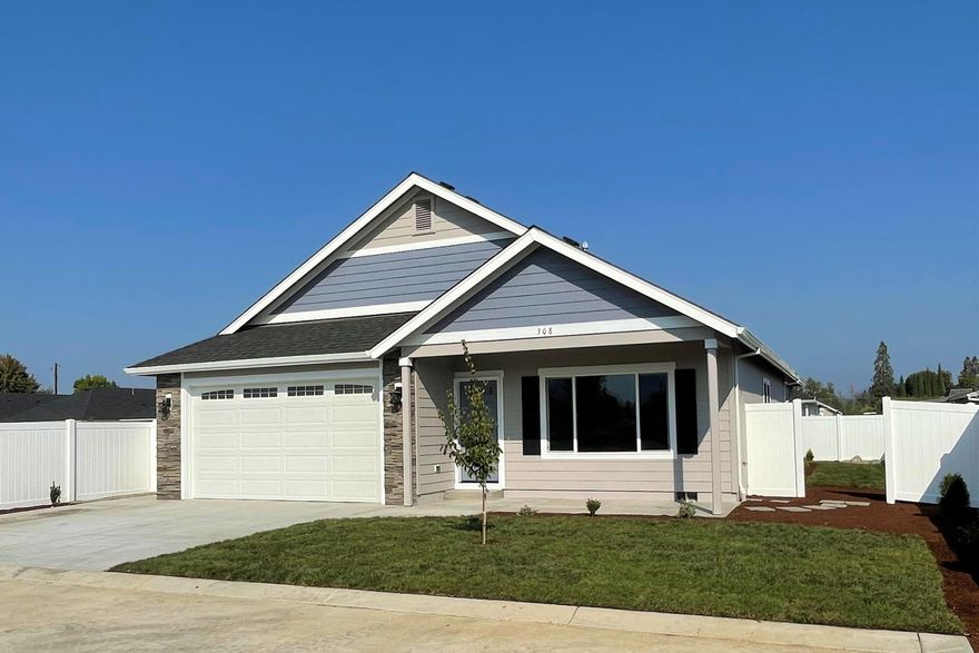 Brand new home in lovely Blackberry Glen! Ask us about premium-service financing below the current mortgage rates. Most interior photos of a prior listing of the same model. Home includes 9 foot ceilings throughout, granite counters & lots of extra storage. The granite, breakfast bar kitchen with custom hickory cabinets & pantry includes stainless steel appliances with microwave hood over the gas range/oven. Master bedroom and bath with dual sinks and large walk-in closet. There's a spacious garage with upgraded 8 foot high garage door and premium, no maintenance, white vinyl fencing.  Access to private, wildland park just a few doors away. Country location close to Schroeder Park on the mighty and majestic Rogue River with rural feel yet with city services and District 7 schools. A no marijuana grow zone, Blackberry Glen is a designed, Pocket Neighborhood-style development for enhanced living enjoyment and sense of community. CALL FOR A LOOK INSIDE TODAY!