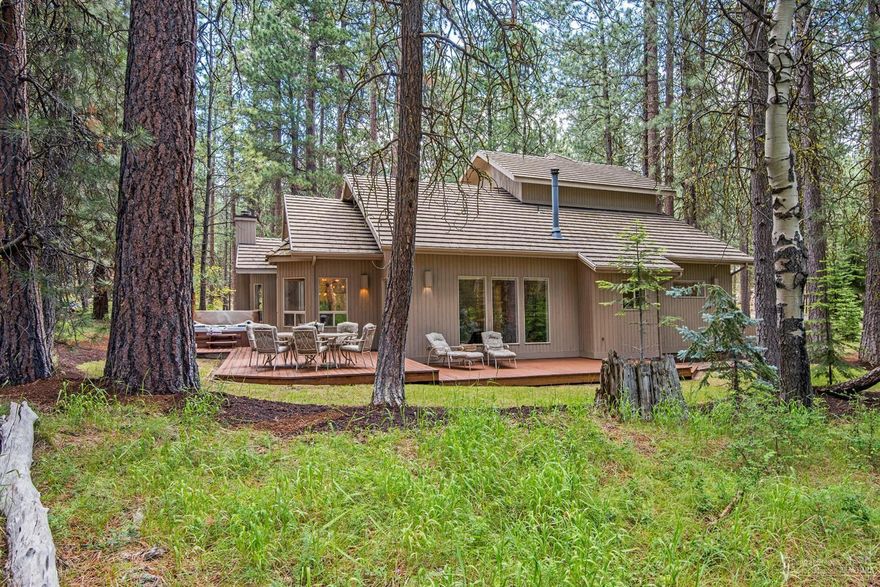 Black Butte Ranch SM13. View aspen trees grove from home, deck and hot tub! For those gatherings, home features living room with fireplace and family room with wood stove. Many cooks can be in this kitchen, with plenty of storage and breakfast bar. Main floor has 2 bedrooms. One with 2 sets of Black Butte classic, 3 tier bunk beds. Second floor features completely private and very spacious master suite, with jetted tub and tiled shower. Exterior painted and decks re-stained June 2019. Great location!