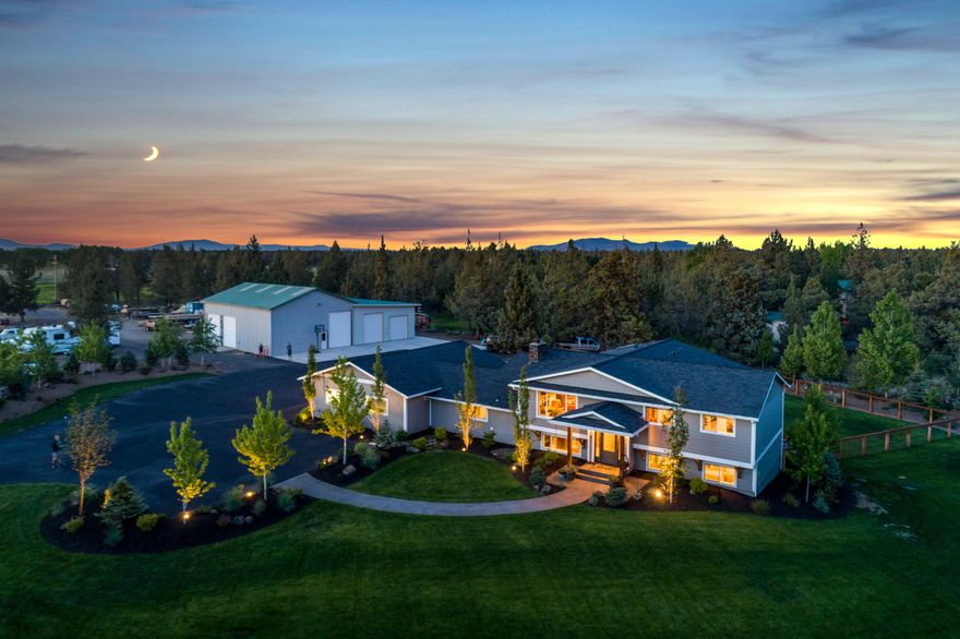 You CAN have it all! Stunning remodel with no corner left untouched, 4.5 acres w/ a beautifully landscaped yard, and a large shop all within minutes of town. Truly the Central Oregon dream! Every inch of this home's 3642sf is beautifully finished and incredibly functional. The gorgeous kitchen features a large eat-in island, 60-inch fridge/freezer, tile finishes w/ wood shelving accents. Relax in