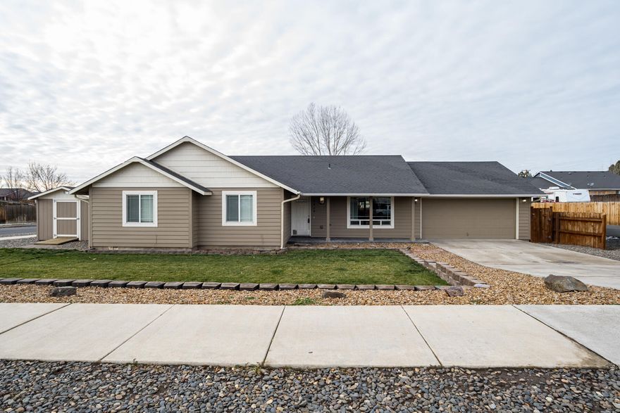 Welcome to Deer Ridge Subdivision!  This Ranch Style home sits on a corner lot, just off of the beaten path,  yet close to everything. The covered front porch and stamped concrete walkway invite evenings on the porch. Featuring main level living with vaulted ceilings and great room. The kitchen is light and bright with an abundance of cabinet storage. Off the great room is the covered back patio with a fully fenced and landscaped yard waiting for you to perfect your BBQ skills.. There is the convenience of a storage shed for your gardening tools. The interior features a large primary suite, almost 1400 square feet of living space. Two additional bedrooms and guest bath complete the interior. There is a 2 car garage just off the kitchen. See list of improvements attached. This is a great home, call your agent today to tour!