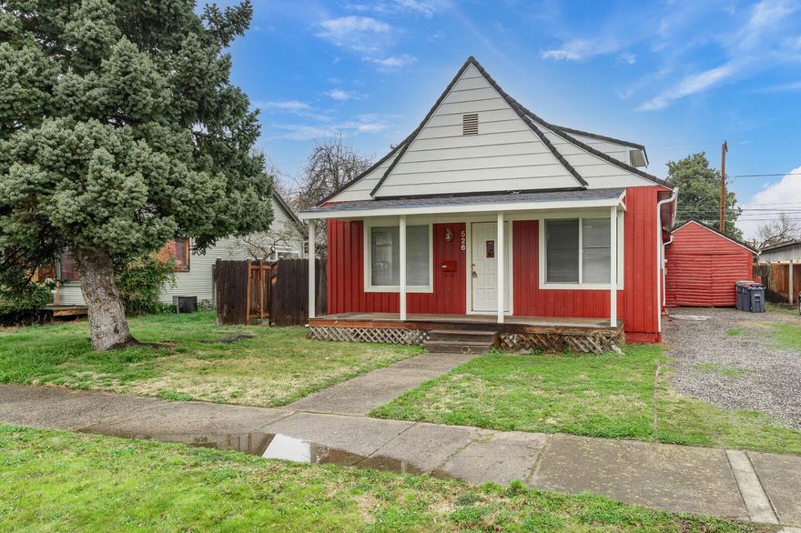BRAND NEW ROOF! WANTED: A new owner for adorable cottage. This home is looking for you to move and make it your own and head into the next chapter of like together. Looking for a great starter home or investment property, this quaint & charming 2 bedroom, 1 bath, 1,000 sq. ft. cottage is centrally located in Medford. This home has new interior paint as well as new exterior paint. Artfully painted hardwood floors in the living room with the kitchen located at the heart of the home. With a room off the kitchen, one may use this space as a home office or a dining area. Gutters were just replaced, there is a detached garage with a finished area off the back for a shop or craft room. There is alley access in the nice sized back yard. Newer HVAC system, installed just over two years ago.