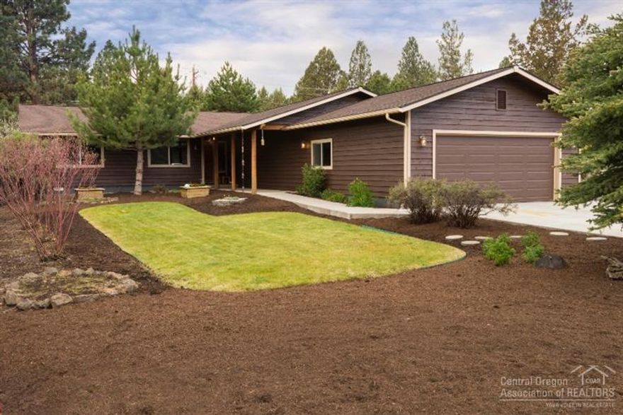 Come see this charming, single level home in the desirable Kingsforest neighborhood! 3 BR, 2 BA home sits on a private & spacious 0.45 acre lot complete with an oversized four-car garage - shop & mud/gear room. Home is perfect for entertaining, with a large kitchen, open flowing floor plan. Master suite has access to a deck with a hot tub. Large fully fenced backyard offers a private sanctuary with a patio, mature landscaping & garden shed. Newer laminate floors, & interior paint. New exterior paint.