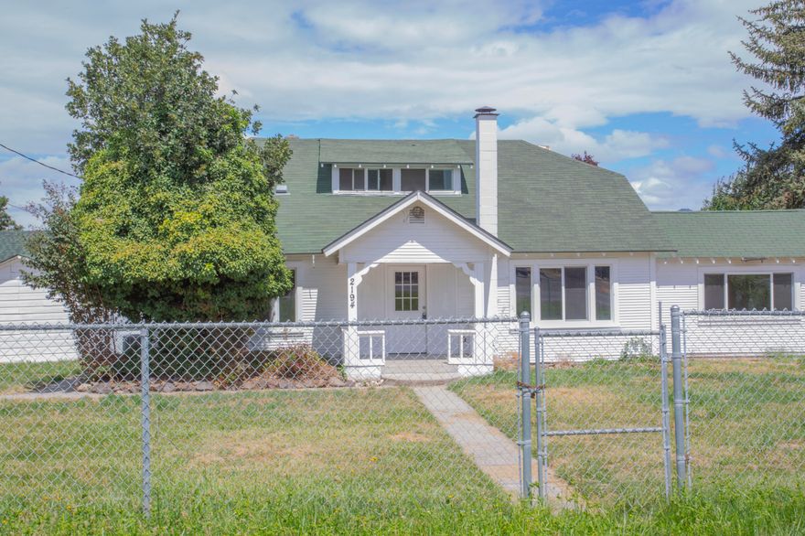 Own your own Southern Oregon two-acre mini farm right in the heart of the Rogue Valley. This home is located on 1.9 pressurized TID irrigated, flat acres with views of the mountains. The home features 2, 100 square feet of space on two floors. Includes four bedrooms, two baths, an upstairs alcove for an office, vaulted ceilings, built in cabinets, farm kitchen with new appliances and original hardwood floors throughout the lower level. Other features, two wells on the property, new septic installed in 2016, Large RV parking area, recently installed A/C unit. The home has been recently updated and is move-in ready for the right buyer. Vacant and easy to show.