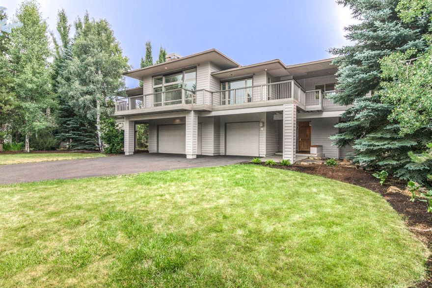 Classic Sunriver design with a hint of modern...Tucked away on quiet Mulligan Lane, this home could be set-up as a luxury rental, a second home get-away or a full-time resident. The home sits on a large (.36 ac.+/-) backing to a private common area with direct access to the walking/cycling path system. A tiled entryway welcomes you into the home on the ground level. High ceilings, even on the lower level, give the home an open feel and the central stairwell faces south with lots of windows to create an atrium-like feel. The lower level has a bonus 
/ media room, a secondary Primary Suite, another full bedroom and another full bath plus access to the three-car garage. As you move up the stairwell, the is small, comfortable deck off of the landing that is perfect for morning coffee. The upper level of the home has a large Great Room w/ wraparound deck, kitchen, utility room, a 1/2 bath, an office/workspace and an oversized Primary Suite. Call you broker for a private showing.