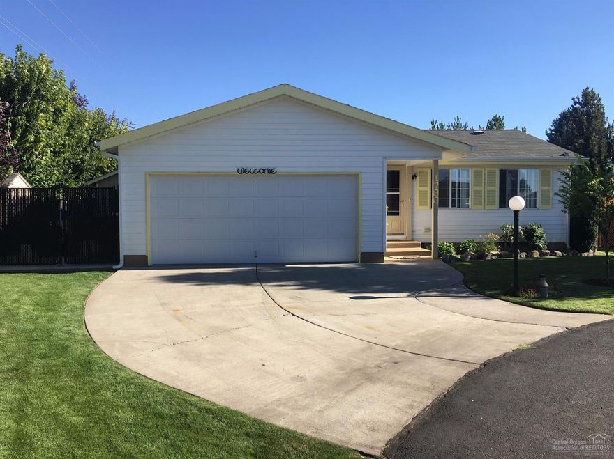 Private 55+ Community. 3 bdrm, 2 bath, open living area, vaulted ceilings, and lots of natural light. This home has been meticulously maintained. Fenced back yard, double attached garage, plus a shop and RV parking waiting for you outside. This home is priced to sell and is move in ready. Centrally located near hospital, schools,, and shopping. A very convenient place to call home!