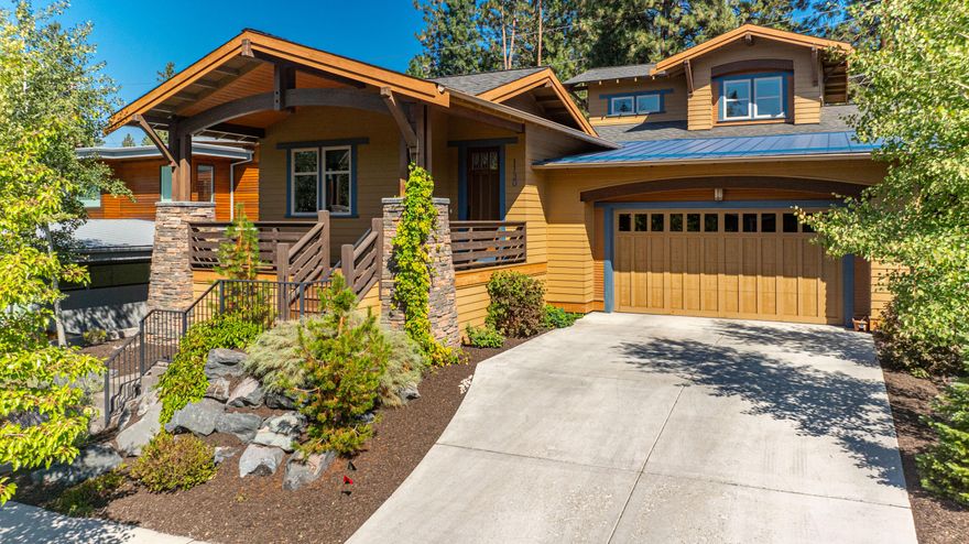 The best of all worlds! Located on a generous lot at the edge of NWX and downtown this home allows you to be minutes from the heart of NWX, downtown to enjoy shops & restaurants or Phils Trail to enjoy miles of trails. A well thought out open concept floor plan gives plenty of options for family or guests. The primary is located on the main floor with an additional flex room with access to its own full bathroom, perfect for a 4th bedroom or a private office.  A focal point of the kitchen is the center island with a timeless SS countertop with cabinets for additional storage. Soft close drawers and a walk in pantry top it all off. Tall mature trees framing a covered paver patio make the backyard a very private haven for outdoor summer entertaining. Lush grass with raised beds give ample space to keep kids and/or pets to keep busy. So many options with this charming home. You choose!