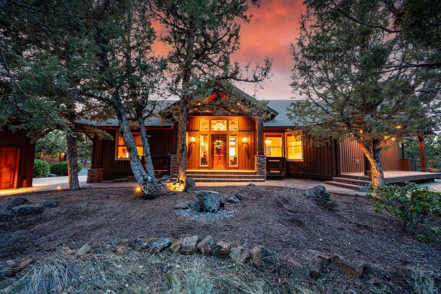 Price Tune-Up! Experience luxury living in this exquisite estate, set on 9.46 acres with stunning Cascade  Mountain Views. This property features a combined 4,123 sq. ft. of refined living space,  including a single-level main residence and a guest suite. The main home offers 3 beds, 3  baths, professional office, & state-of-the-art kitchen w/ slab granite countertop, a marble island, hardwood floors and a large detached garage. Additional highlights include a Tesla charging station, stone gas fireplace, solar power, professionally landscaped, Indoor RV/Boat parking, and a newly added hot tub. Recent upgrades include a New Furnace/AC/Appliances. This property includes a spacious 1,920 sq. ft. shop featuring laundry, full bath, flexible office/gym space & a large guest quarter above. This prime location offers convenient access to trails, parks, downtown amenities and the new  Costco - Gas Station nearby. Experience a perfect blend of luxury & functionality in this unparalleled estate.