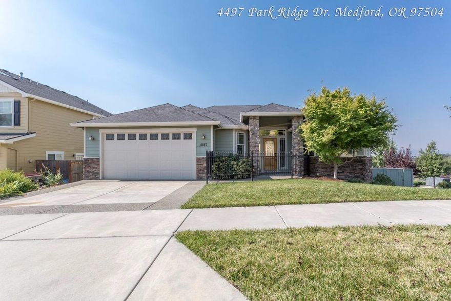 Amazing two-family setup, with views of the valley. Ground level has a huge master suite with fire place and access to the deck, a second bedroom or office, guest bathroom and a spacious common area that opens to the kitchen. Lower level has two more bedrooms and a guest bathroom and French doors that lead to the fenced backyard. This is a short sale & requires third party approval, short sale addendum available online. Must Tour! 3D virtual tour available online.